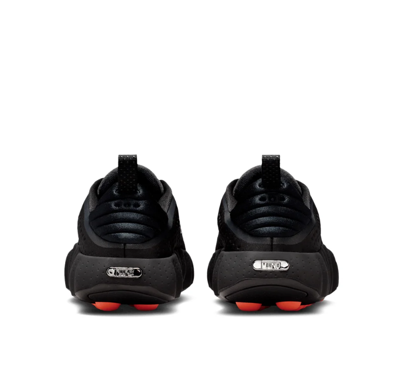Nike Black Low-Top Sneakers with Orange Sole Pods and Silver Swooshes