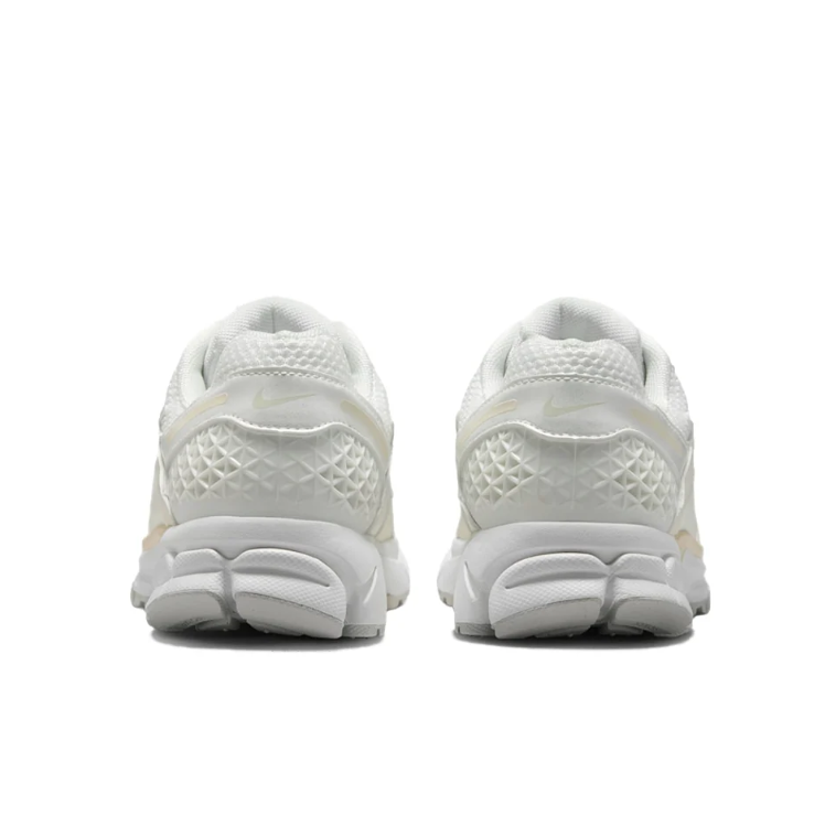 Nike White and Ivory Low-Top Sneakers with Lattice Heel and Segmented Sole